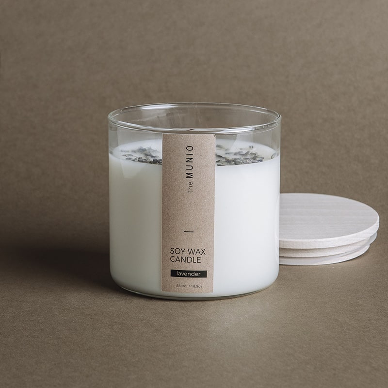 the MUNIO Soy Wax Candle in Glass Votive with Wooden Wicks